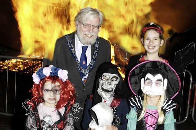 Melton Senior Townwarden Ian Wilkinson with some of the best fancy dress entrants at the 2019 Halloween event in Play Close
PHOTO DEREK WHITEHOUSE EMN-211025-110753001