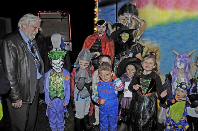 Some of the fabulous fancy dress entres at Friday's Halloween event at Melton's Play Close with Senior Town Warden Ian Wilkinson
PHOTO DEREK WHITEHOUSE EMN-210111-131137001