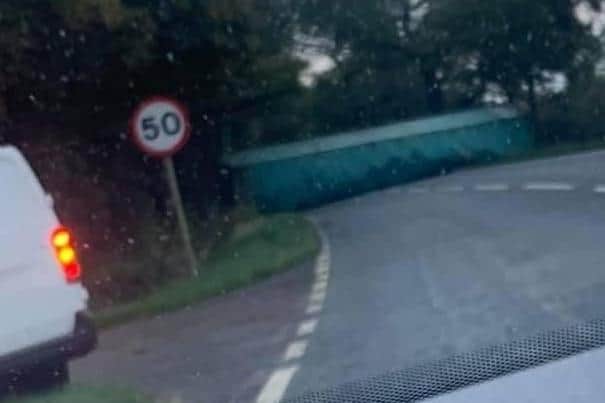 A photo of the overturned lorry at Denton Hill posted on social media this morning EMN-210411-110203001
