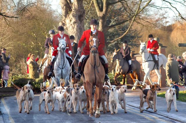 Hounds and riders with the Cottesmore Hunt are led away from the Play Close park on the way to Saxby Road during a New Year meet at Melton back in 2017 EMN-210811-114018001