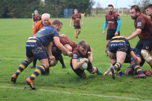 Sam Dennison touches down. Photo: Rob Goldthorpe