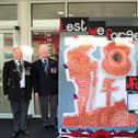 The Remembrance display created by students and staff at Melton's John Ferneley College with, from left, Melton Royal British Legion branch members Danny O'Brien and Peter Roffey, Mayor of Melton, Councillor Peter Faulkner, and school head of design technology, Sharon Rowell EMN-210911-095309001