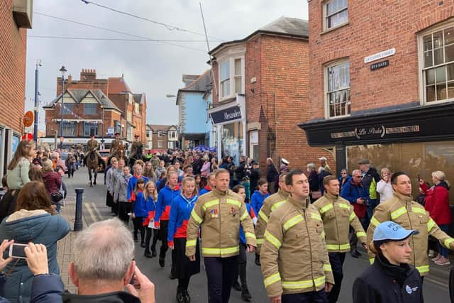 Today's Remembrance Sunday parade through Melton Mowbray town centre EMN-211114-173029001