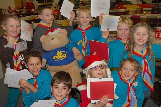 Flashback to 2012 when Scouts, cubs and beavers were sorting out the Christmas post for their traditional fundraiserPHOTO: Tim Williams EMN-211123-093755001