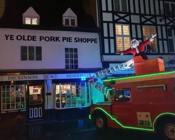 The Trumpton fire engine pictured in Nottingham Street during its annual fundraising tour of Melton this Christmas EMN-201229-093207001