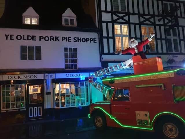 The Trumpton fire engine pictured in Nottingham Street during its annual fundraising tour of Melton this Christmas EMN-201229-093207001