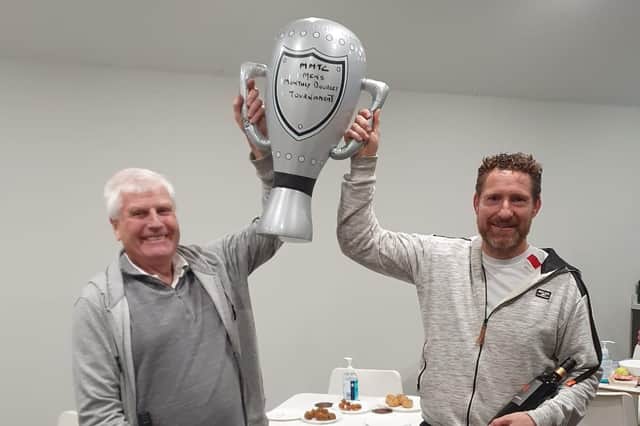 Gareth Jones and Stuart Mullard celebrate their title at Melton Mowbray TC.