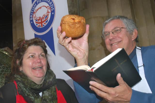 TV chef Rachel Green helps the Rev Kevin Ashby with the blessing of the pies at the British Pie Awards in 2014 EMN-211129-170118001