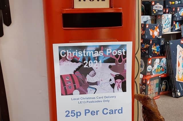 One of the Melton Scouts Christmas card collection points at the town's Foxy Lots shop EMN-211221-110605001
