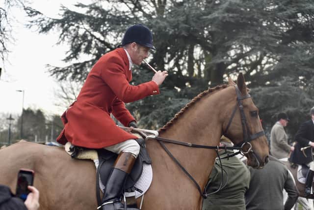 A member of the Quorn Hunt sounds the bugle at the New Year's Day meet in Melton

PHOTO GEORGE ICKE EMN-220301-114846001