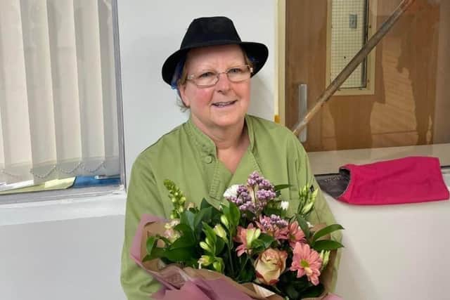 Long-serving Glynis Martin opens the new extension at the Long Field Spencer Academy canteen EMN-221201-093118001