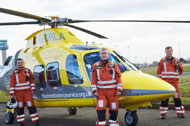 Crew members with the Derbyshire, Leicestershire& Rutland Air Ambulance (DLRAA), and Warwickshire & Northamptonshire AirAmbulance (WNAA). EMN-220701-102747001