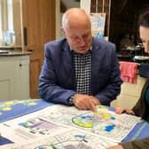 Melton Borough Council leader Joe Orson examines the route of the approved Melton Mowbray Distributor Road (MMDR) with Rutland and Melton MP, Alicia Kearns
