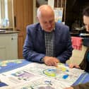 Melton Borough Council leader Joe Orson examines the route of the approved Melton Mowbray Distributor Road (MMDR) with Rutland and Melton MP, Alicia Kearns