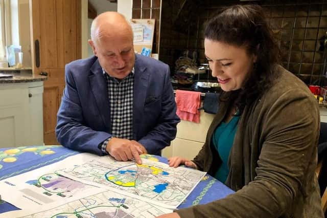 Melton Borough Council leader Joe Orson examines the route of the approved Melton Mowbray Distributor Road (MMDR) with Rutland and Melton MP, Alicia Kearns