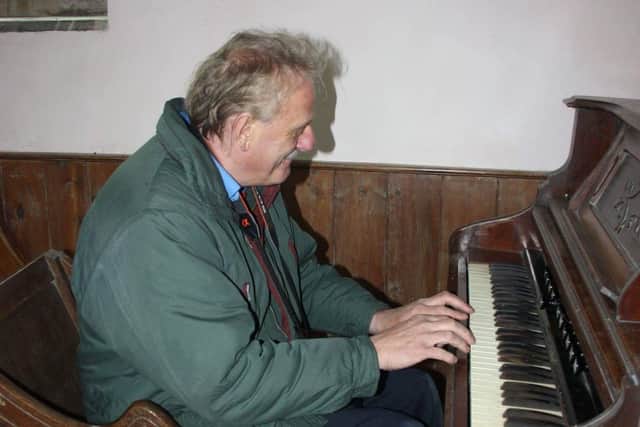 The late Roy Templeton pictured playing a keyboard EMN-220118-094507001