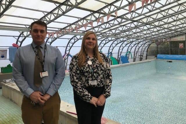 Nathan Odom, head of estates and admissions for Discovery Schools, and Sarah Sadler, executive head at Asfordby Captain Close School, pictured by the school swimming pool EMN-220102-105249001