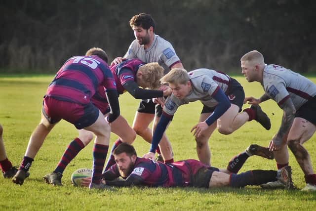 James Cavner, Tom Wilkins and Karl McGee in support at a ruck. Photo: Tim Williams