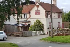 The Red Lion pub at Stathern - the community is attempting to buy it and reopen it as a community asset EMN-220402-100302001