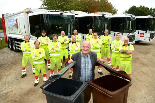 Melton Council leader, Councillor Joe Orson, with members of the bin collection team EMN-220802-133002001