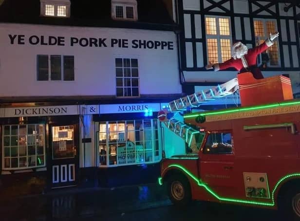 The Trumpton fire engine pictured in Nottingham Street during its annual fundraising tour of Melton EMN-220216-132440001