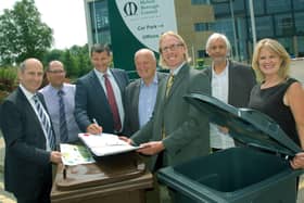 Melton Council leader, Councillor Joe Orson, and chief executive, Edd de Coverly, pictured in June 2018 with officials from Biffa, at the signing of the borough's new waste contract EMN-220214-162341001