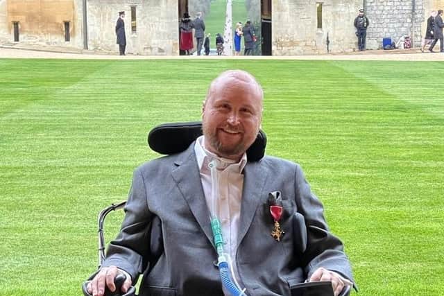 Matt Hampson with his OBE at Windsor Castle shortly after being presented with it by Princess Anne EMN-220215-111530001