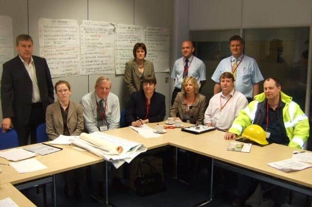 Jim Worley (extreme left) pictured with Melton Borough Council collegues during a meeting in 2008 shortly after the fire which burned down their offices, Christine Marshall, Malise Graham, Lynn Aisbett, Dawn Garton, Angela tebbutt, Keith Aubrey, Colin Wilkinson, Paul Evans and Richard Barker

03/06/2008 EMN-220221-121550001