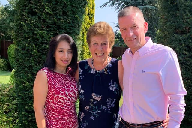 Gary Postle, who is preparing for a fundraiser run in aid of Leicester Royal Infirmary's stroke team, with wife Amyesha and mum Glenice EMN-220218-113750001