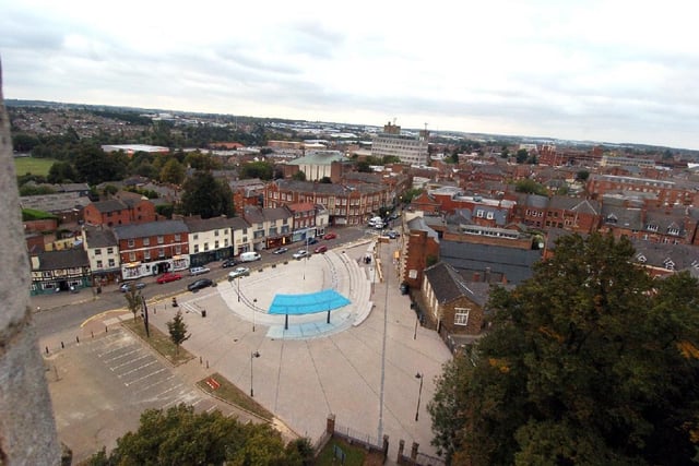The Market Place as viewed from the top of the church; the car park where the restaurants are now can still be seen on the left