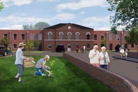 An artist's impression of the what the planned redevelopment of Melton's old St Mary's Hospital site might look like at the entrance to the site on Thorpe Road EMN-220225-173516001