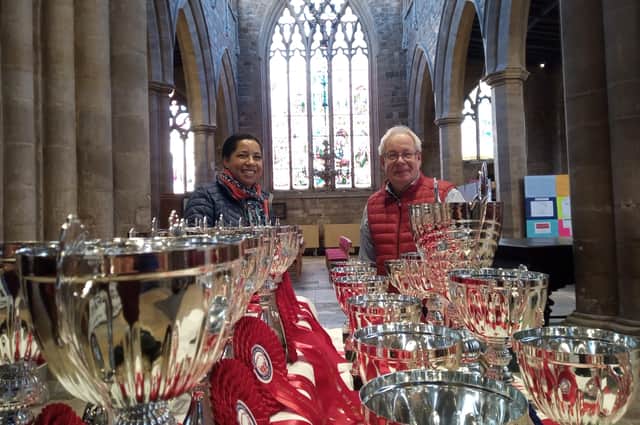 Matthew O'Callaghan, of the Melton Mowbray Food Partnership and British Pie Awards organiser, with BBC Countryfile presenter Margarita Taylor during an interview at Melton's St Mary's Church for the upcoming programme EMN-220228-122447001