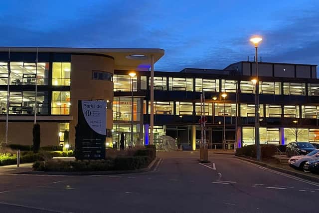 The Melton Borough Council offices lit up in the blue and yellow colours of the Ukraine flag EMN-220228-111639001