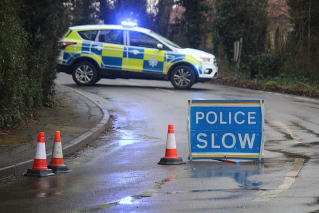 A police road block in Colston Bassett this week as officers continue to investigate the murder
PHOTO GEORGE ICKE EMN-220228-182813001