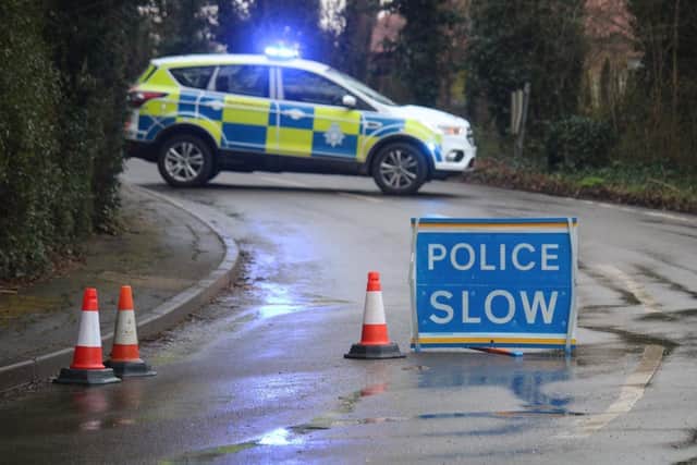 A police road block in Colston Bassett this week as officers continue to investigate the murder

PHOTO GEORGE ICKE EMN-220228-182813001