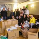 Some of the many volunteers involved with processing donations for the relief effort for Ukrainian refugees organised at the Polish Club in Melton

PHOTO ADAM SHAW EMN-220803-134220001
