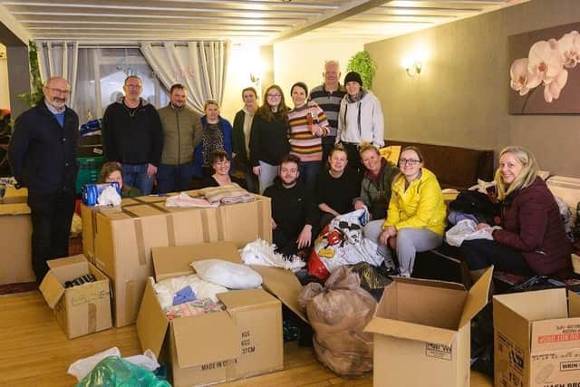 Some of the many volunteers involved with processing donations for the relief effort for Ukrainian refugees organised at the Polish Club in Melton
PHOTO ADAM SHAW EMN-220803-134220001