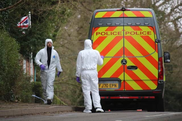 Police forensics officers in Colston Bassett as officers investigated the murder
PHOTO GEORGE ICKE EMN-220803-111639001