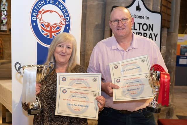 Phil and Kath Walmsley, of Old Dalby-based Nice Pie, celebrate successes in multiple categories at the British Pie Awards at Melton
PHOTO Martin Elliott - Mepics EMN-220314-132002001