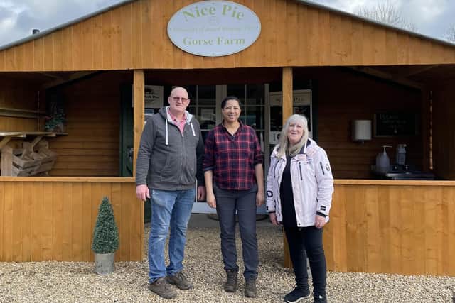 Countryfile television presenter Margherita Taylor pictured with Phil and Kath Walmsley at their Old Dalby-based Nice Pie site for the special episode featuring Melton's food heritage EMN-220316-095358001