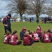 The Vixens get a pep talk.