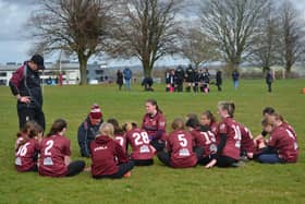 The Vixens get a pep talk.