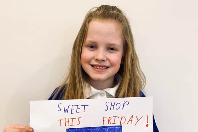Arabella Fisher (7), who raised money for Ukrainian families by organising a tuck shop at Whissendine School EMN-220318-175732001