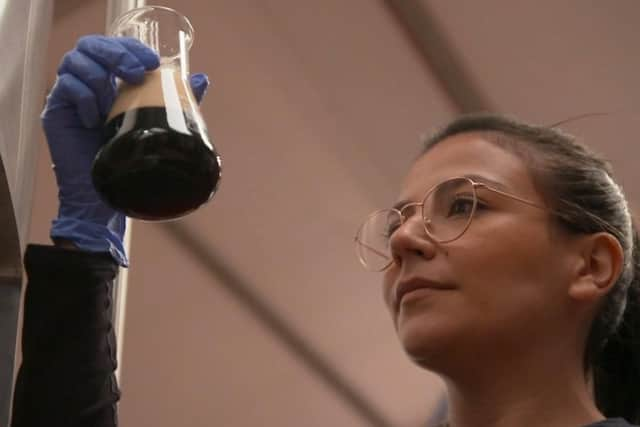 Brewer Lara Lopes checks a beer at Round Corner Brewing in Melton during Sunday's Countryfile programme EMN-220323-132513001