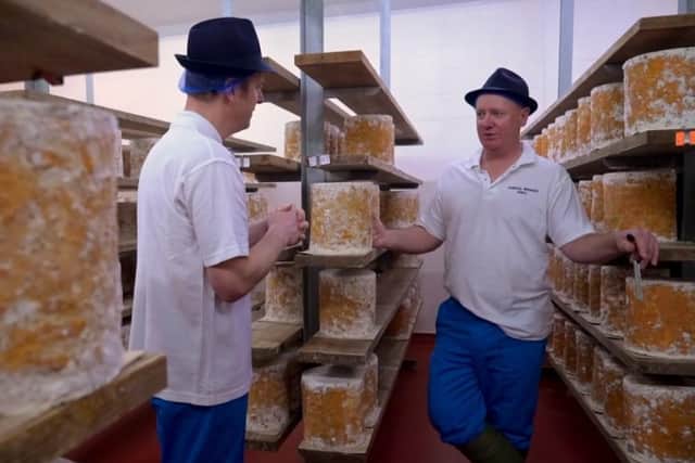 Presenter Matt Baker learns about Stilton cheese production from manager Billy Kevan at Colston Bassett Dairy during Sunday's Countryfile programme EMN-220323-132453001