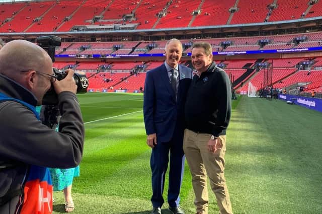 Steve Freer (right) pictured with England legend Geoff Hurst at Wembley before Saturday's match against Switzerland EMN-220330-122848001