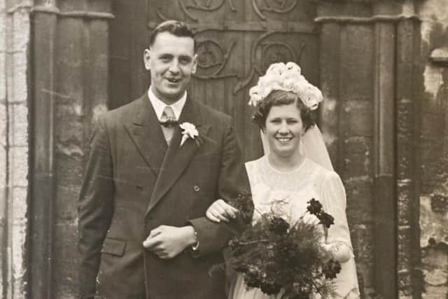 Bob and Brenda Gathercole pictured outside St Mary's, Melton, on their wedding day in March 1952 EMN-220404-171124001