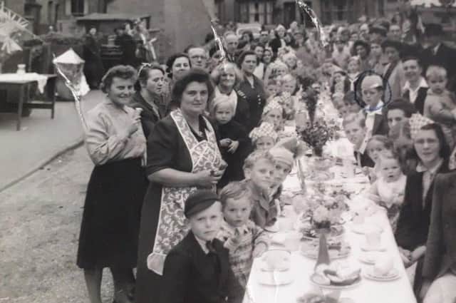 Residents who lived in houses off Burton Road, Melton, pictured during a street party to celebrate VE Day iin May 1945 EMN-220504-133744001