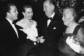 Author Agatha Christie (right) talking to impresario Peter Saunders (centre), actor Richard Attenborough and his wife Sheila Sim, at a party to celebrate her play 'The Mousetrap' (photo: Getty Images)