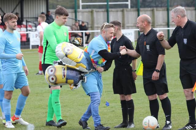 Stephen Abbott celebrates turning 40 by walking as mascot for Melton Town FC for their match at Skegness Town EMN-221104-094819001